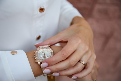 Woman checking the time on her watch